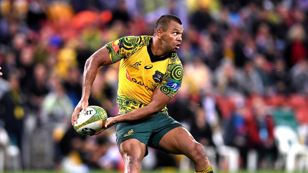 Kurtley Beale passes the ball during the Bledisloe Cup match between the Wallabies and the All Blacks at Suncorp Stadium in 2017. 