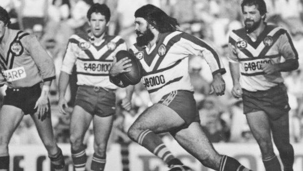 Bulldogs cult hero Geoff Robinson charges at the Balmain defence in the 1980s.