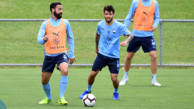 Potentially playing on: Sydney FC's Alex Brosque with Daniel De Silva at training.