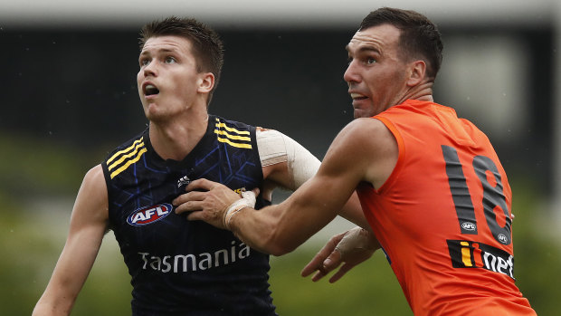 Ned Reeves (left) and Jonathon Ceglar contest the ruck during a Hawks’ intra-club match. 