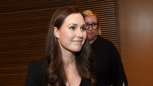 Sanna Marin smiles after she won the SDP's prime minister candidate vote against Antti Lindtman in Helsinki, Finland, on Sunday.