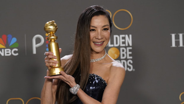 Michelle Yeoh with her award for Best Performance by an Actress in a Motion Picture, Musical or Comedy for Everything Everywhere All at Once.