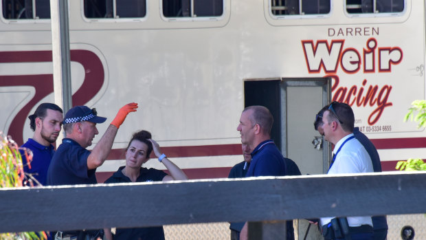 Police are seen at Darren Weir Stables in Miners Rest, Victoria, on Wednesday.