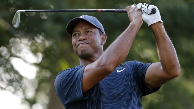 Brush with royalty: Tiger Woods at the PGA on Thursday.