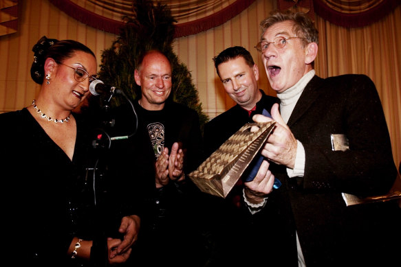 Lord of the Rings actor Sir Ian McKellen accepts a gift from MPs Georgina Beyer, Chris Carter and Tim Barnett. 