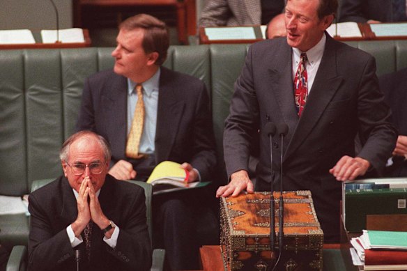 John Howard in 1996, with then treasurer Peter Costello and Geoff Prosser (right), the then-minister for small business who would resign under Howard’s watch.  