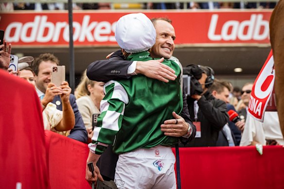 James McDonald and Chris Waller celebrate winning the 2025 Cox Plate with Via Sistina at Moonee Valley.