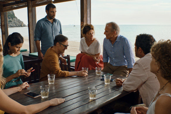 Friends gather as an asteroid approaches Earth in The Order of Time. 