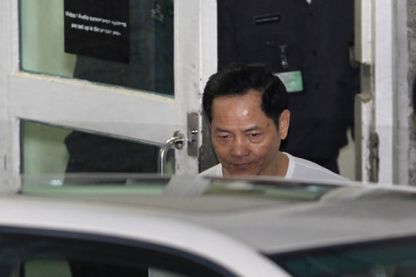 Macau crime boss Wan Kuok Koi, known as Broken Tooth, walks out of Coloane Prison in Macau in 2012.