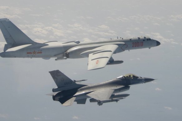 A Taiwan Air Force F-16 fighter jet flies alongside a Chinese H-6K bomber during an incursion into Taiwan’s airspace in 2018.
