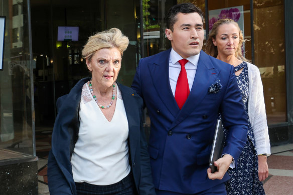 Former NSW opposition leader Kerry Chikarovski leaves court with her son’s solicitor, Bryan Wrench, in November.