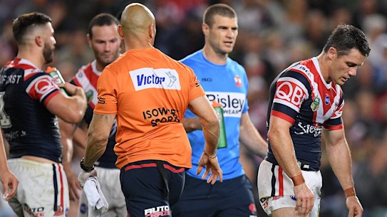Cronk plays through injury as Roosters defence shuts down Rabbitohs