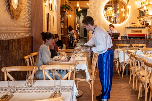 Staff in national costume at Otakoi Ukrainian Restaurant.