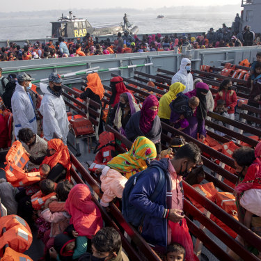 Unable to return to Myanmar for fear of persecution, these Rohingya refugees are on a Bangladesh navy vessel, being moved from an overcrowded camp on mainland Bangladesh to Bhasan Char island, In late December.