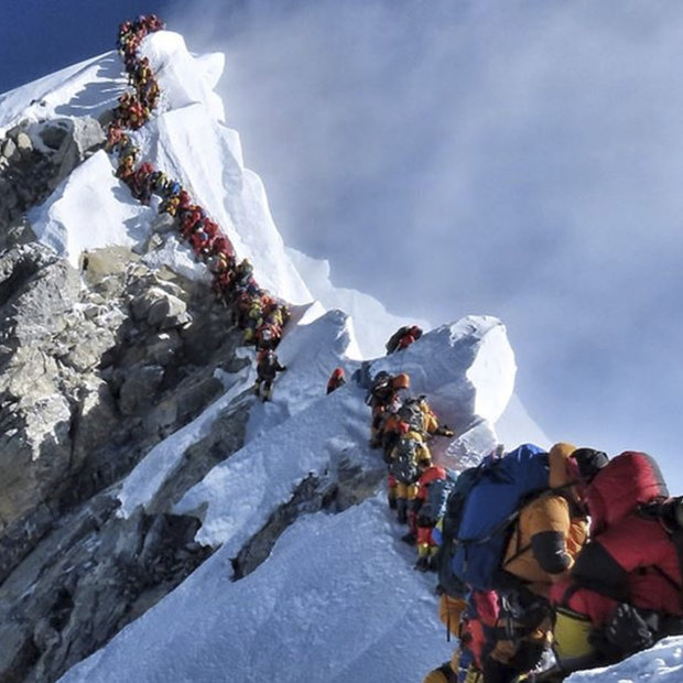 Climbers on Everest on May 22 this year. Long delays increase the risk that climbers will run out of oxygen: “If you’ve got to wait in a bloody queue, you’re knocking on heaven’s door,” says Australian climber Greg Mortimer.