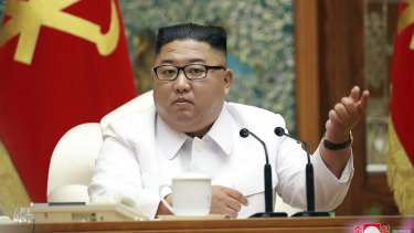 In this photo provided by the North Korean government, Kim Jong-un attends an emergency Politburo meeting in Pyongyang on Saturday, July 25, 2020. 
