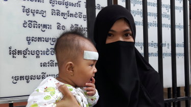 Phally has travelled to Phnom Penh to seek treatment for her daughter Noroyanash's dengue fever.