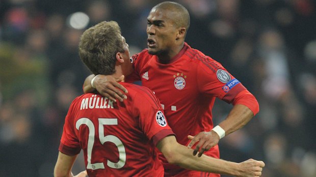 Douglas Costa and Thomas Müller in their days together at Bayern Munich.