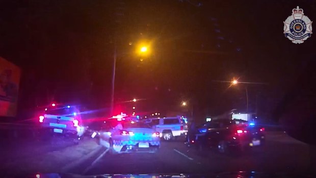 The moment police close in as the allegedly stolen Porsche comes to a stop on Loganlea Road in Loganlea.