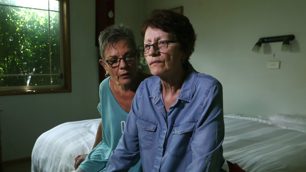 Lynda Henderson, left, with her partner, Veda Meneghetti, who has early onset dementia.