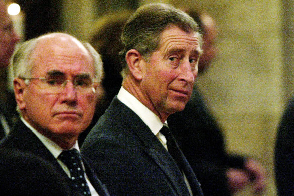 Then Australian prime minister John Howard and Prince Charles pray at Southwark Cathedral for the Bali bombing victims.