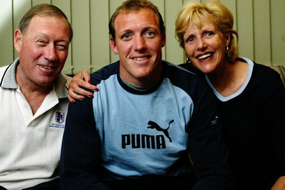 Craig Fitzgibbon with his father Allan and mother Michelle in 2003.  