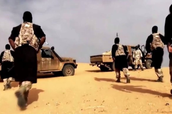 AQIM (Al-Qaeda in the Lands of the Islamic Maghreb) fighters in a propaganda video, somewhere in the Sahara Desert in 2017. This footage was taken by Al-Andalus Media Productions, the media branch of AQIM. 