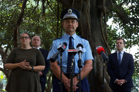Minister for Police and Emergency Services David Elliott, Assistant Commisioner Mark Jones and Attorney-General and Minister for the Prevention of Domestic Violence Mark Speakman address the media in March about domestic violence support services during lockdown.  
