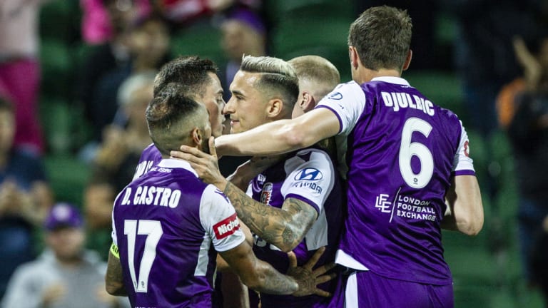 Decisive: Perth Glory celebrate after Chris Ikonomidis pounced on a chance to break the deadlock against Melbourne City.