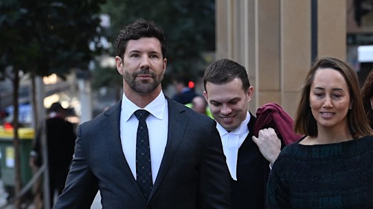Heston Russell, left, and his legal team outside the Federal Court in Sydney on Friday.