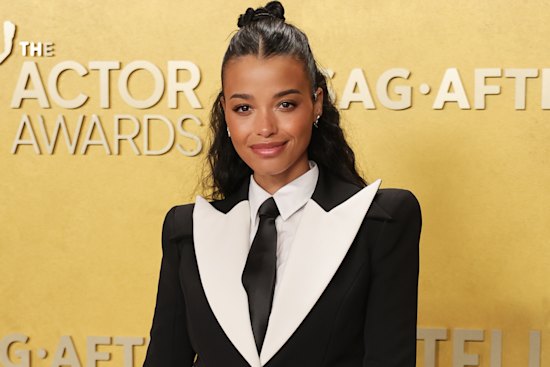 Actor Ella Balinska goes for the classic tux at a recent awards show.