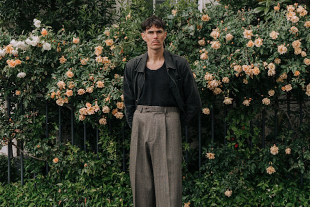 Melbourne content creator Dirk Fourie in pleated trousers