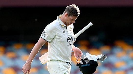 Steve Smith trudges off the Gabba unbeaten on 91.