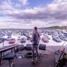 Danish musician Mads Langer performs to an audience in socially distanced cars.