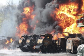 Vehicles on fire at an oil depot after missiles struck the facility in an area controlled by Russian-backed separatist forces in Makiivka, 15 km east of Donetsk, on Wednesday, May 4, 2022. 