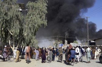 Plumes of smoke rise into the sky after fighting between the Taliban and Afghan security personnel in Kandahar, Afghanistan, southwest of Kabul.