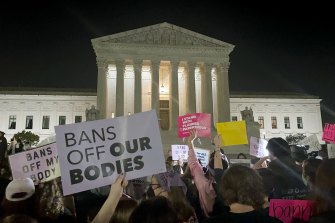 Crowds gathered outside the Supreme Court on Monday night after a draft was leaked suggesting Roe v Wade would be repealed.