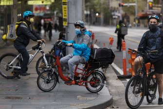 Food delivery cyclists working during the coronavirus lockdown in Sydney. 