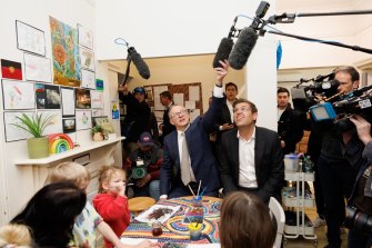 Opposition Leader Anthony Albanese meets children in West Ryde with Bennelong Labor candidate Jerome Laxale on Thursday.