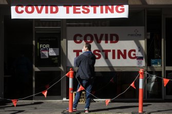 A man queues at a COVID-19 testing centre at Campsie in Sydneyâ€™s south-west on Friday.