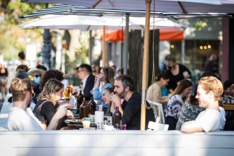 People enjoy outdoor dining on Gertrude street in Fitzroy on Friday.