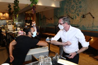 Premier Dominic Perrottet and Minister for Jobs and Western Sydney Stuart Ayres visit small businesses at the Casula Mall in South West Sydney on October 7, 2021. NSWPOL. Photo: Photo: Dominic Lorrimer