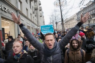 Alexei Navalny, pictured here at the centre of a 2018 rally, is expected to survive the poisoning but remains unconscious in a serious condition. Anti-Putin protesters in the far east of Russia now chant Navalny's name, demanding justice.