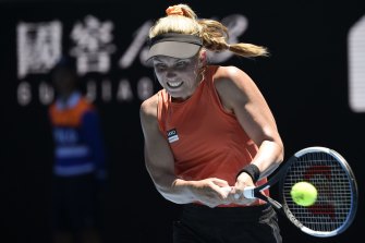 Maddison Inglis of Australia plays a backhand return to Hailey Baptiste of the U.S. during their second round match at the Australian Open tennis championships in Melbourne, Australia, Thursday, Jan. 20, 2022. (AP Photo/Andy Brownbill)