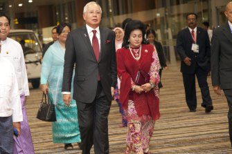 Then Malaysian prime minister Najib Razak, centre, with his wife  Rosmah Mansor in 2014.