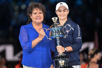Evonne Goolagong Cawley presents Ashleigh Barty with her Australian Open trophy.