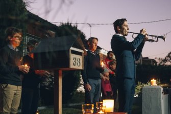 Albie Woodhouse plays The Last Post on trumpet for a driveway dawn service for ANZAC Day in 2020.