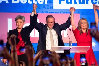 Prime Minister Anthony Albanese with his girlfriend Jodie Haydon and senator Penny Wong. Despite the ALP’s success, its primary vote fell to a level not seen since the 19030s. 