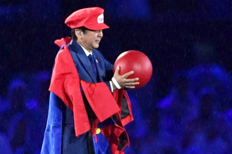 Shinzo Abe appears as the Nintendo game character Super Mario during the closing ceremony at the 2016 Summer Olympics in Rio de Janeiro.
