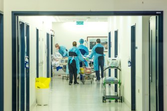 Austin Hospital staff tend to a patient.